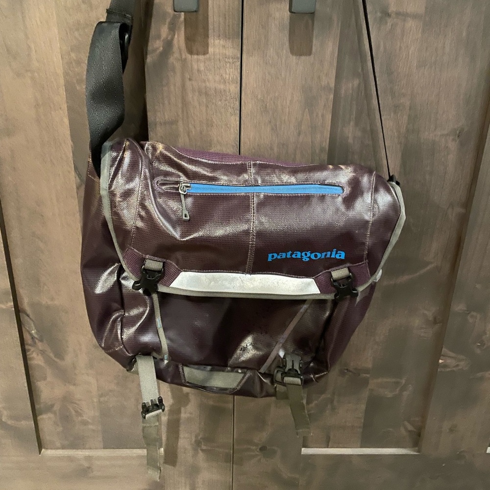 Patagonia small Blackhole Messenger Bag. Purple